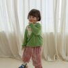 33B44764-4192-407D-A927-379E16EC26B9 諾曼第V領荷葉針織衫
